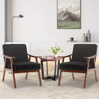 Poltroncina con schienale a orecchioni e gambe in legno massello