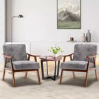 Poltroncina con schienale a orecchioni e gambe in legno massello