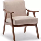 Poltroncina con schienale a orecchioni e gambe in legno massello