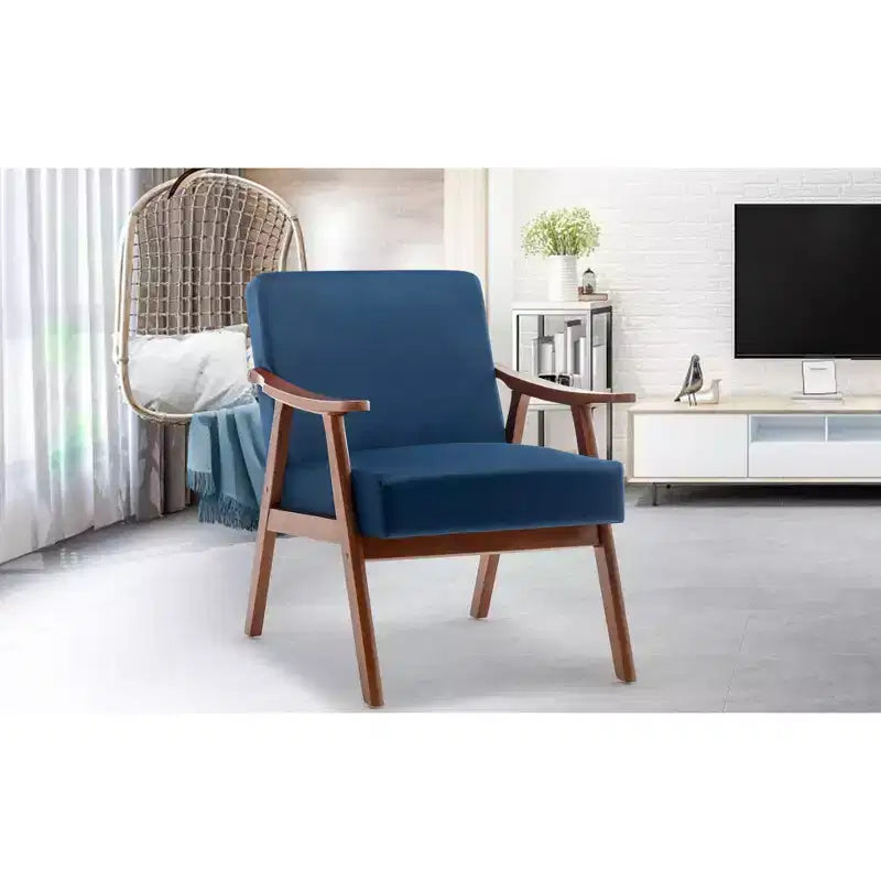 Poltroncina con schienale a orecchioni e gambe in legno massello