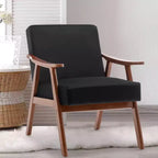 Poltroncina con schienale a orecchioni e gambe in legno massello